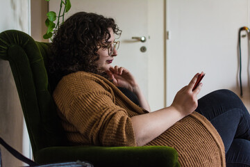 Woman reading book on e-reader