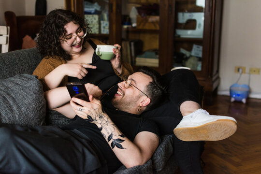 Couple relaxing on the couch