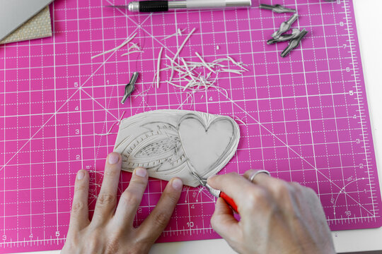 Linocut heart stamp print craft making. Love concept