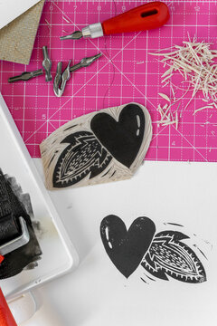 Linocut heart stamp print craft making. Love concept