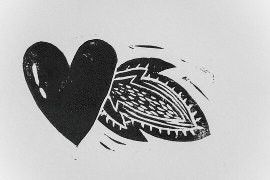 Linocut heart stamp print craft making. Love concept