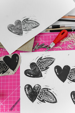 Linocut heart stamp print craft making. Love concept