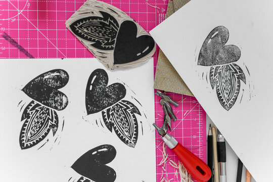 Linocut heart stamp print craft making. Love concept