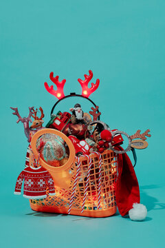 baket packed of different christmas ornaments