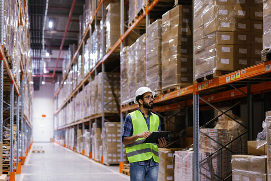 Uniform worker using tablet