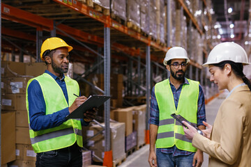 Business team warehouse managing goods discussion work