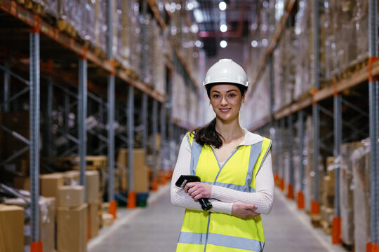 Warehouse inspector in uniform posing at camera