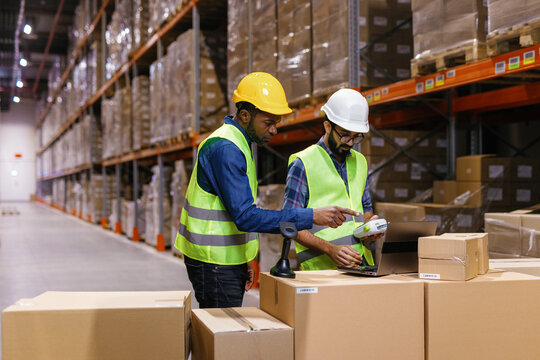 Warehouse service team working label calculating goods
