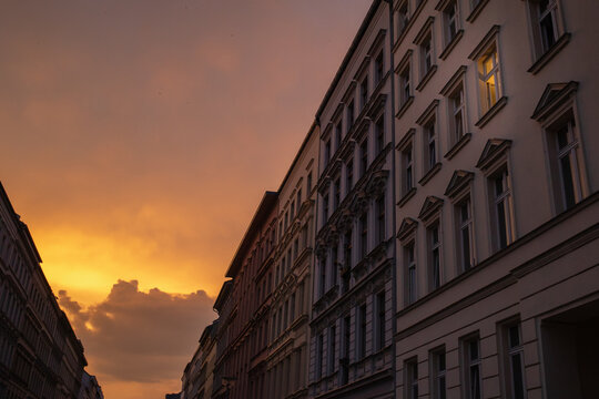 Berlin Evening Tranquility: After-Rain Sunset Over Altbau Street
