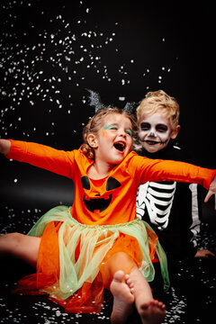 Two kids having fun on Halloween