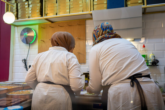 Two Muslim Cooks in the Kitchen