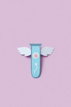 Paper test tube with two wings filled with male sperm and female egg