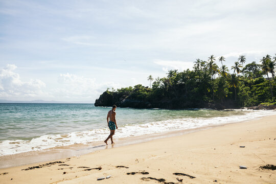 Man enjoying a day at the beach in the Caribbean Sea.