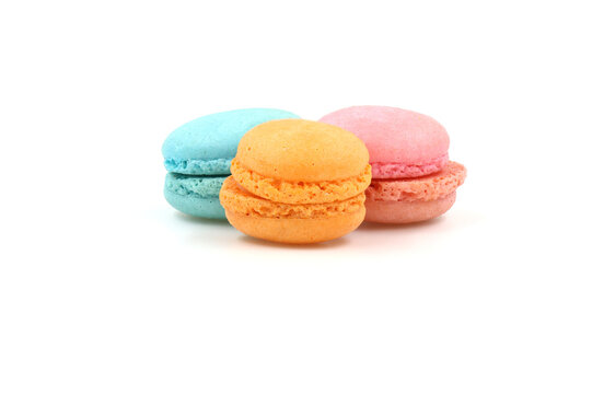 Sweet colorful macarons isolated on white background. Tasty colourful macaroons.
