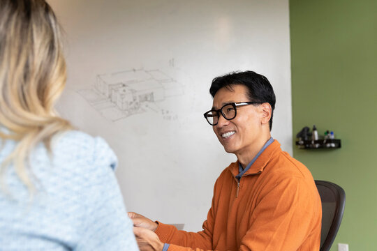 Businesswoman job interview with asian businessman