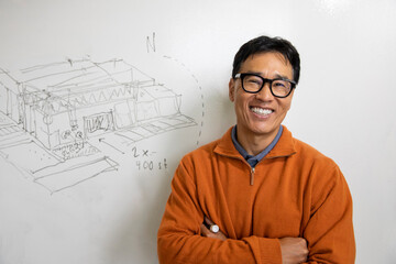 Portrait Handsome Confident Asian  architect Businessman at office 