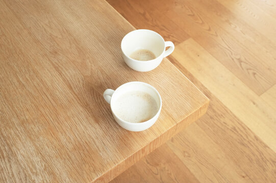 Cozy business photo of coffee cups  on wooden office table