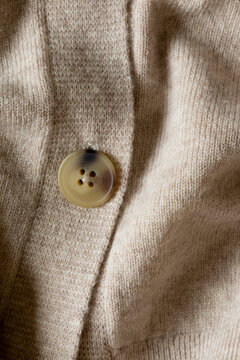 Knitted wool cardigan with button