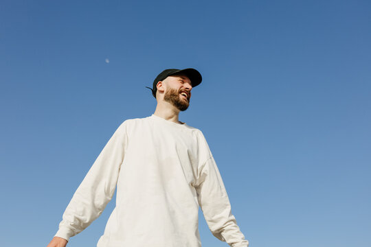 Portrait of a man against the sky