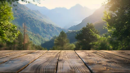 Papier Peint photo Cappuccino Empty wooden table Wooden table on a mountain view background The mountains are covered with trees and the sky is clear. The mountains give a feeling of calm.
