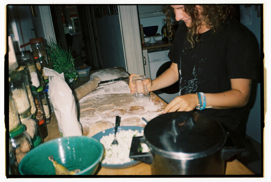 UGC candid film portrait cooking at home