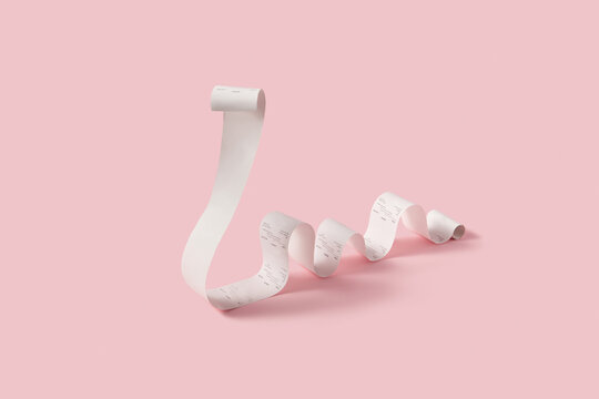 Pay receipt rolled in shape of snake of pink background