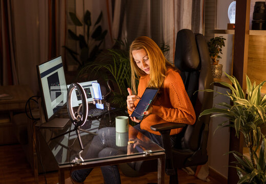 woman streaming showing graphs