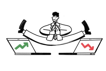 Businessman on two laptops with rising and falling stock market arrows