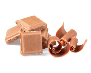 Delicious chocolate shavings and pieces isolated on white