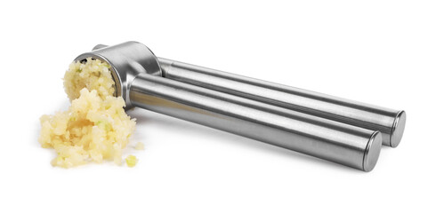 One metal press and crushed garlic isolated on white