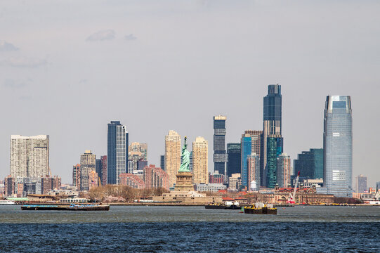 Manhattan Skyline Framed by the Statue of Liberty