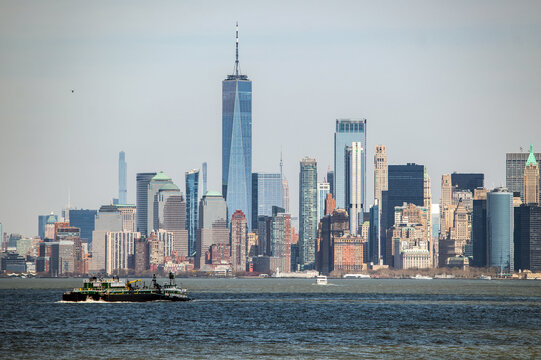 Skyline of Manhattan with One World Trade Center and Sailing Ship