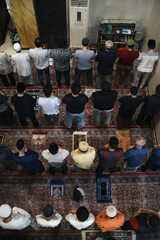 Muslim peoples do tarawih prayer at  mosque. Congregational prayer.