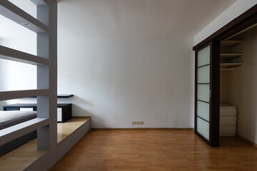 Open floor plan: small empty studio flat with integrated spaces