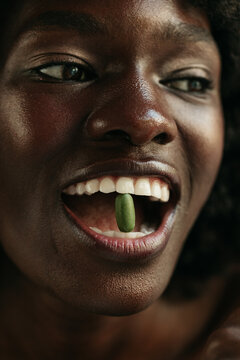 Woman taking pill