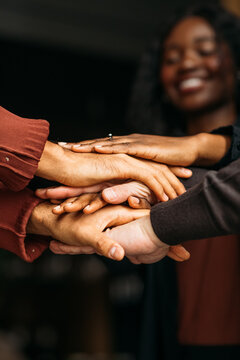 Colleagues Stacking Hands