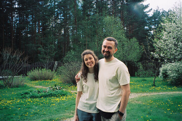 Young just married couple after wedding in the forest