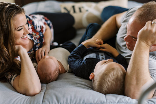 smiling family playing at home indoors 