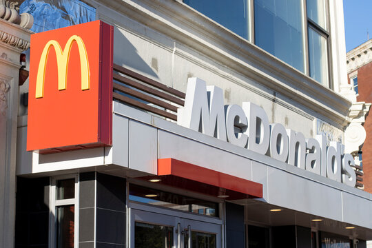 Waltham, MA, USA - June 30, 2022: McDonald's sign is seen at the entrance to one of its chain restaurants in Waltham, Massachusetts.
