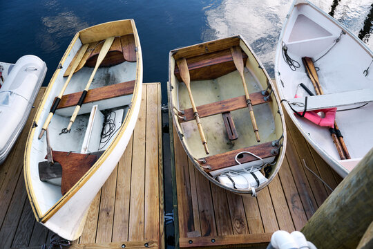 Multiple boats grounded on a dock in coastal Maine