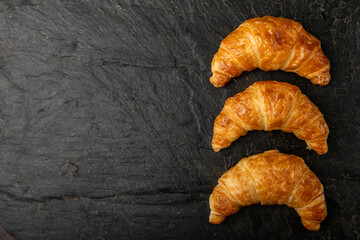 croissants (which are invoices like a croissant) and a hot drink such as coffee, tea or mate (traditional from Argentina), which can be used for marketing, posters or menus.