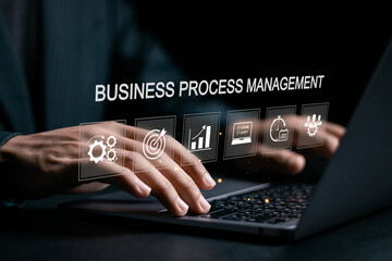 BPM, Business process management concept. Business data analytics and business strategic planning. Businessman use laptop with BPM icon on virtual screen.
