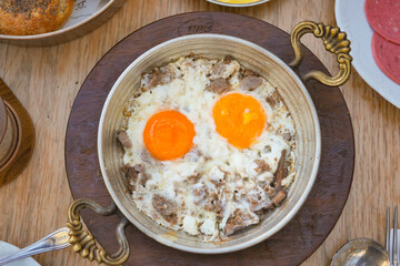 double Fried eggs in a cooking pan close up ,