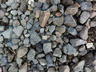 A bunch of gravels in the yard
