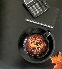 calculator and coffee