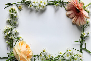 paper with flower decoration on the edge for greeting cards or promotional media. copy space. woman ideas. romantic paper. wedding day