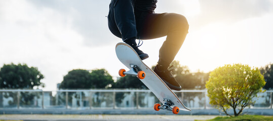 Skateboarder skateboarding in modern city