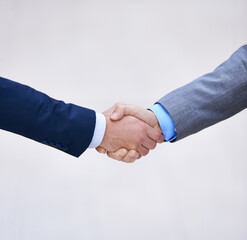 Closeup, business people and handshake for deal, collaboration and b2b partnership agreement for consultant. Welcome, introduction and shaking hands for support, thank you or mockup space in office