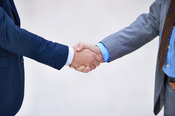 Closeup, business people and shaking hands for deal, collaboration and b2b partnership agreement for consultant. Welcome, introduction and handshake for greeting, meeting and thank you in office