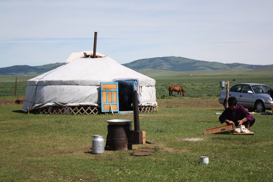 A nomadic family lives together with the tranquil surroundings in the Bulgan steppe, Bulgan province, Mongolia. The family has around 50 Takhi horses roaming freely in the large steppes.
